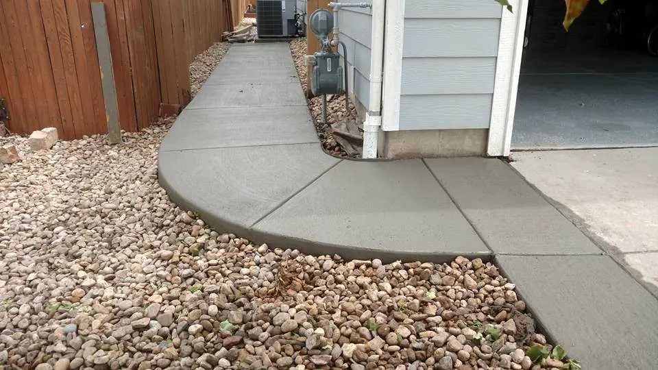Curving walkway to a side door