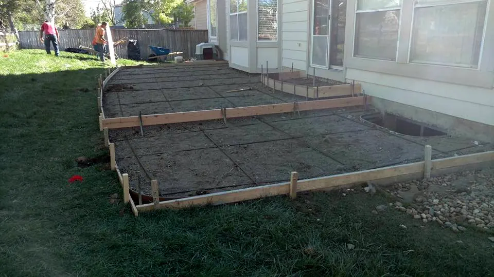Forms staked out for a large backyard patio