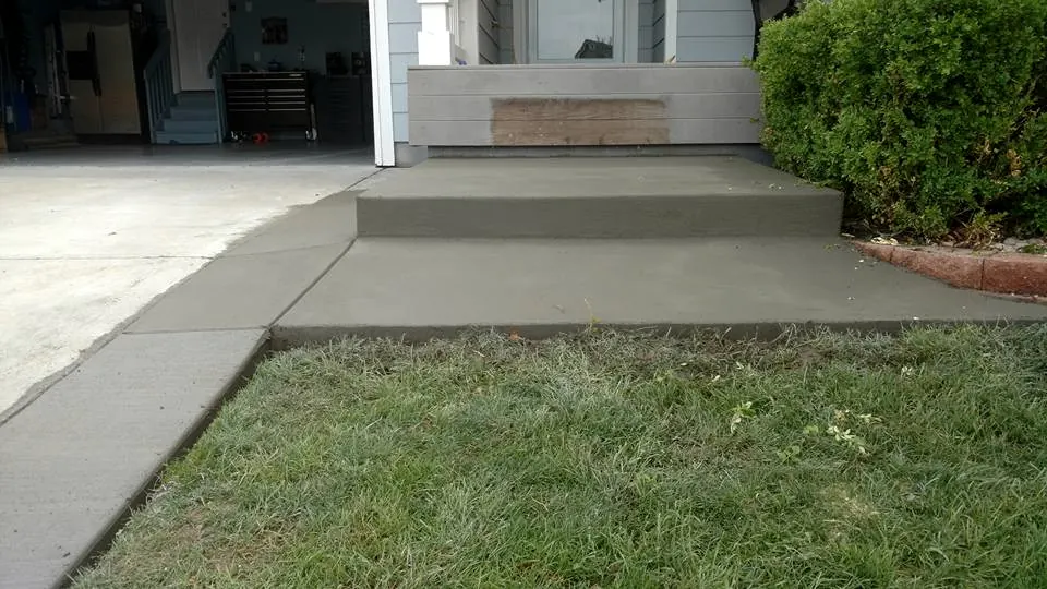 Front step and walk at a covered entry