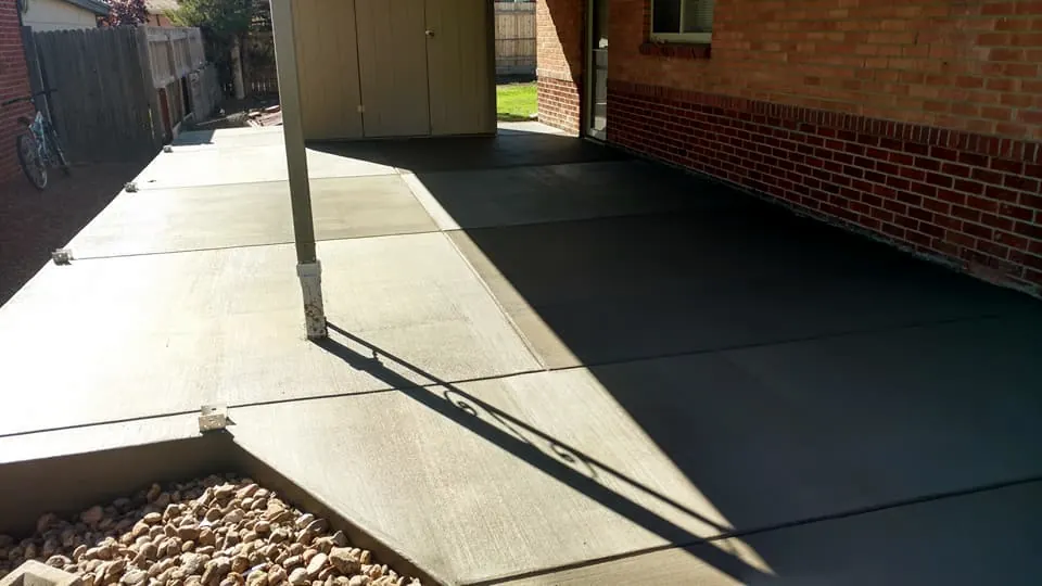 Patio and walk along a brick home