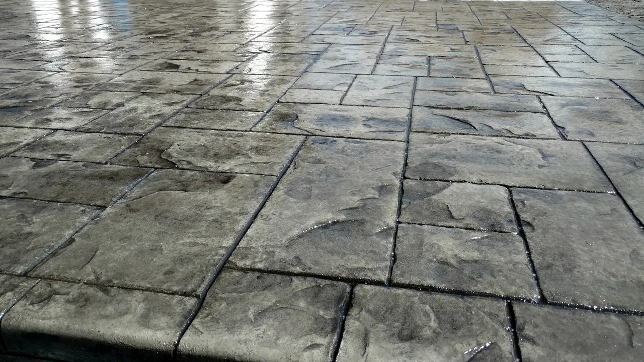 Close view of ashlar-slate stamped texture after sealing