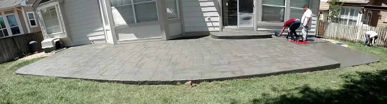 Panoramic view of a stamped patio with curved steps