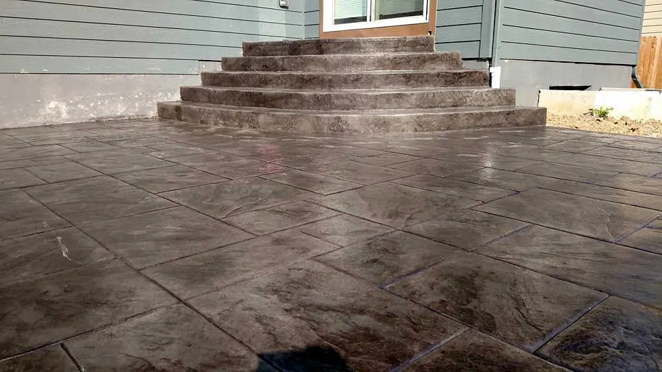 Stamped patio with radius steps at the back door